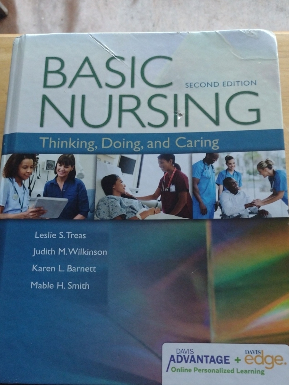 Basic Nursing Thinking, Doing, and Caring - Blue Textbook Cover